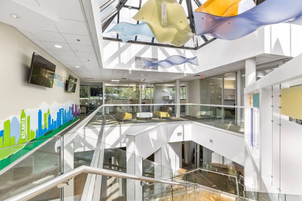 MCC Office Suites - Brentwood coworking office space- Second floor with skylights and modern art